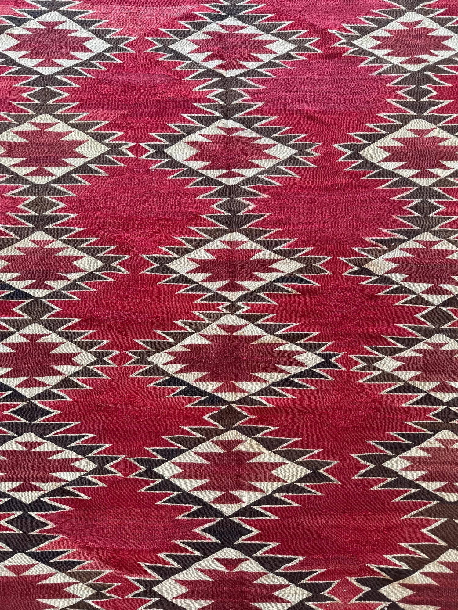 Navajo Red Field Rug, circa 1900, actual catalog view 9